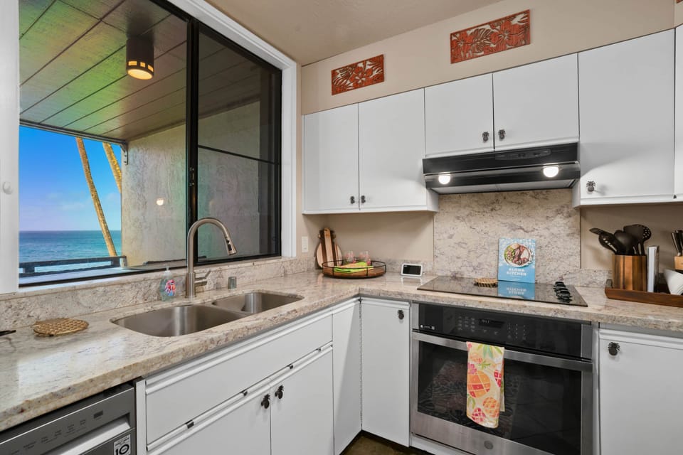 Updated kitchen featuring ocean views and granite counters.