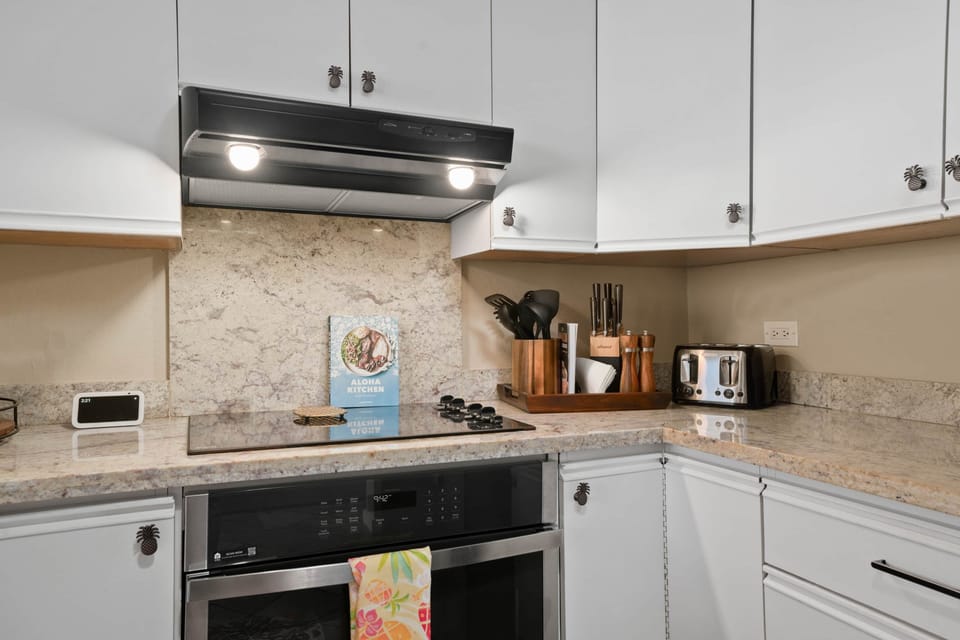 Well-equipped kitchen with sleek appliances and ample storage.