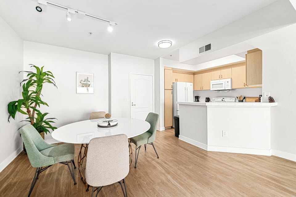 Modern dining area with style and great light fixtures.