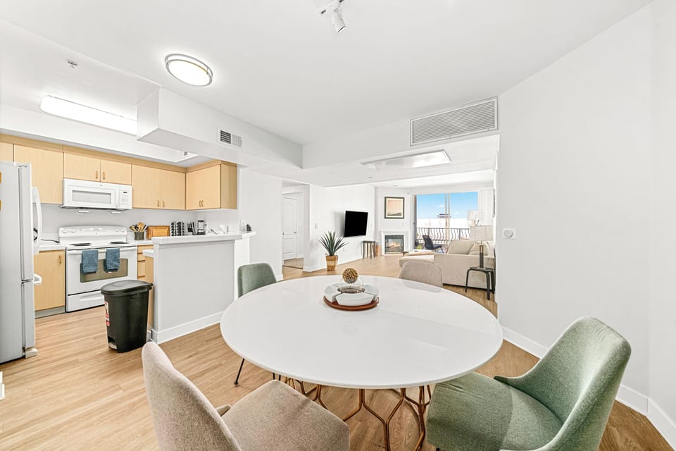 Modern kitchen and stylish dining area anchor the living space.