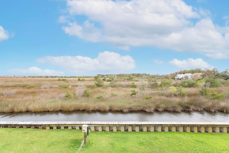 Enjoy peaceful Roanoke Sound views from your private balcony at Sweet Retreat.