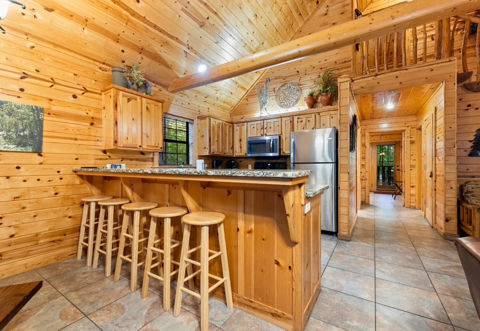 Bar seating and open kitchen space for group cooking fun.