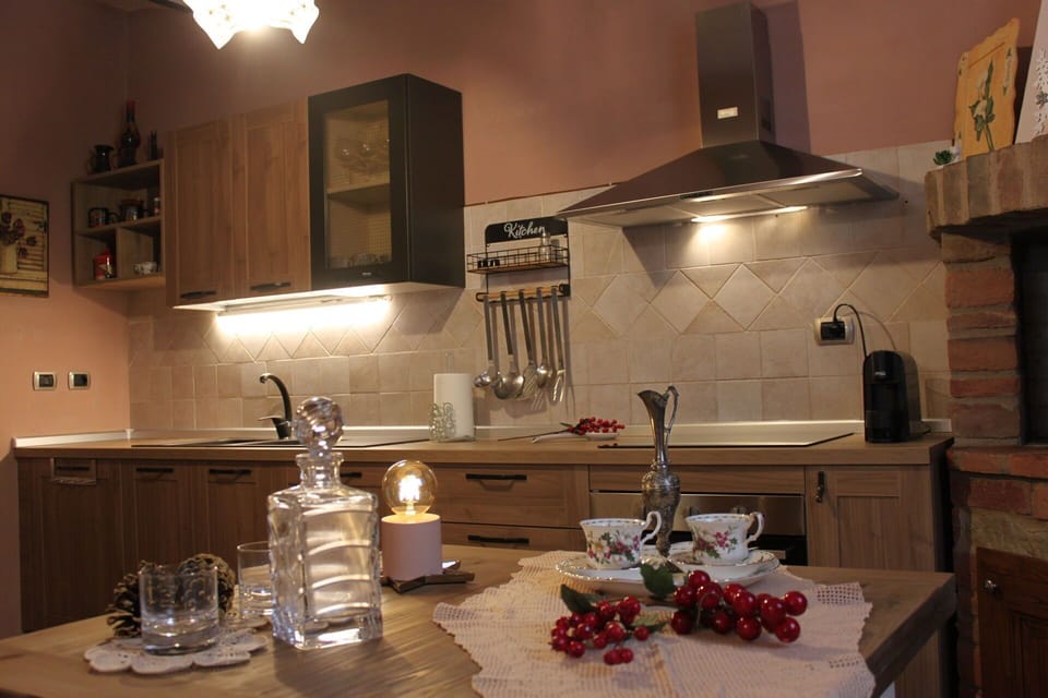 Kitchen, Interior Design, Kitchen Appliance, Furniture, Countertop, Light Fixture, Cabinetry, Flooring, Ceiling, Lighting