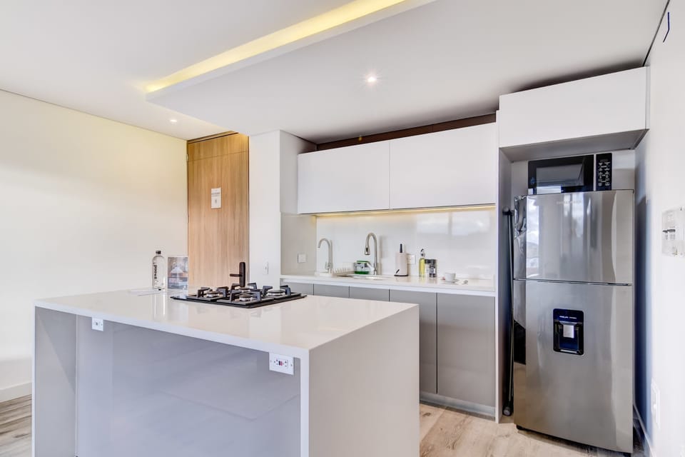 Open kitchen design with warm lighting