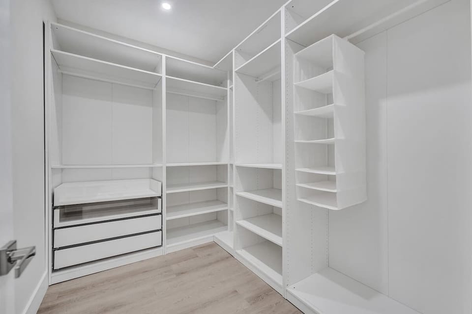Generous closet space with hangers and shelves in every room. 