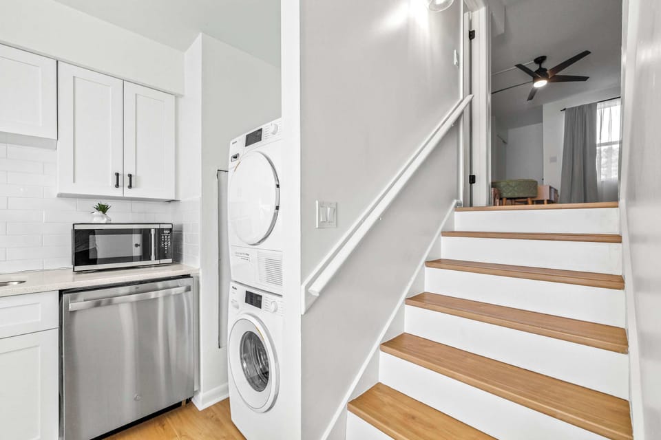 Stackable washer and dryer in the kitchen