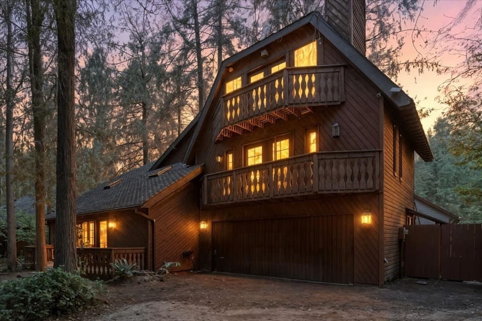 Exterior: Charming chalet nestled among towering trees, perfect for your Oregon getaway!