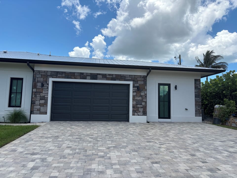 Parking to right of garage, just outside your private door!