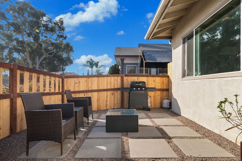 Kick back outside—this fenced yard is your own private hideaway