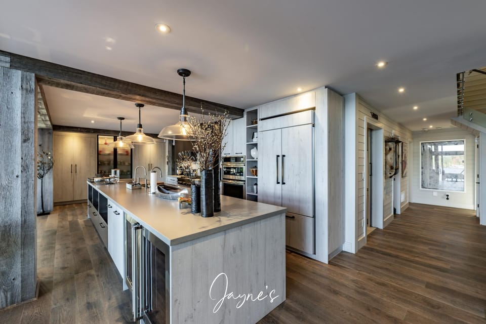 Spacious modern kitchen with sleek island and cozy dining nook