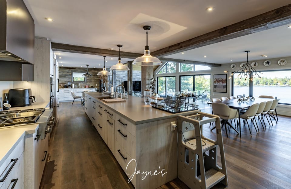 Spacious kitchen and dining area with scenic water views
