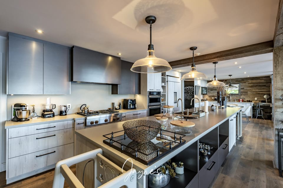 Modern kitchen with sleek island and ambient lighting