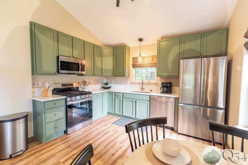 Whip up a delicious meal in this beautiful kitchen featuring stainless steel appliances and ample counter space. We have thought of everything.