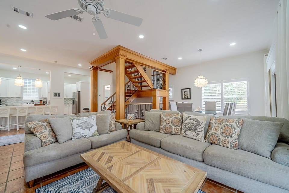 Spacious living room with cozy seating and natural light