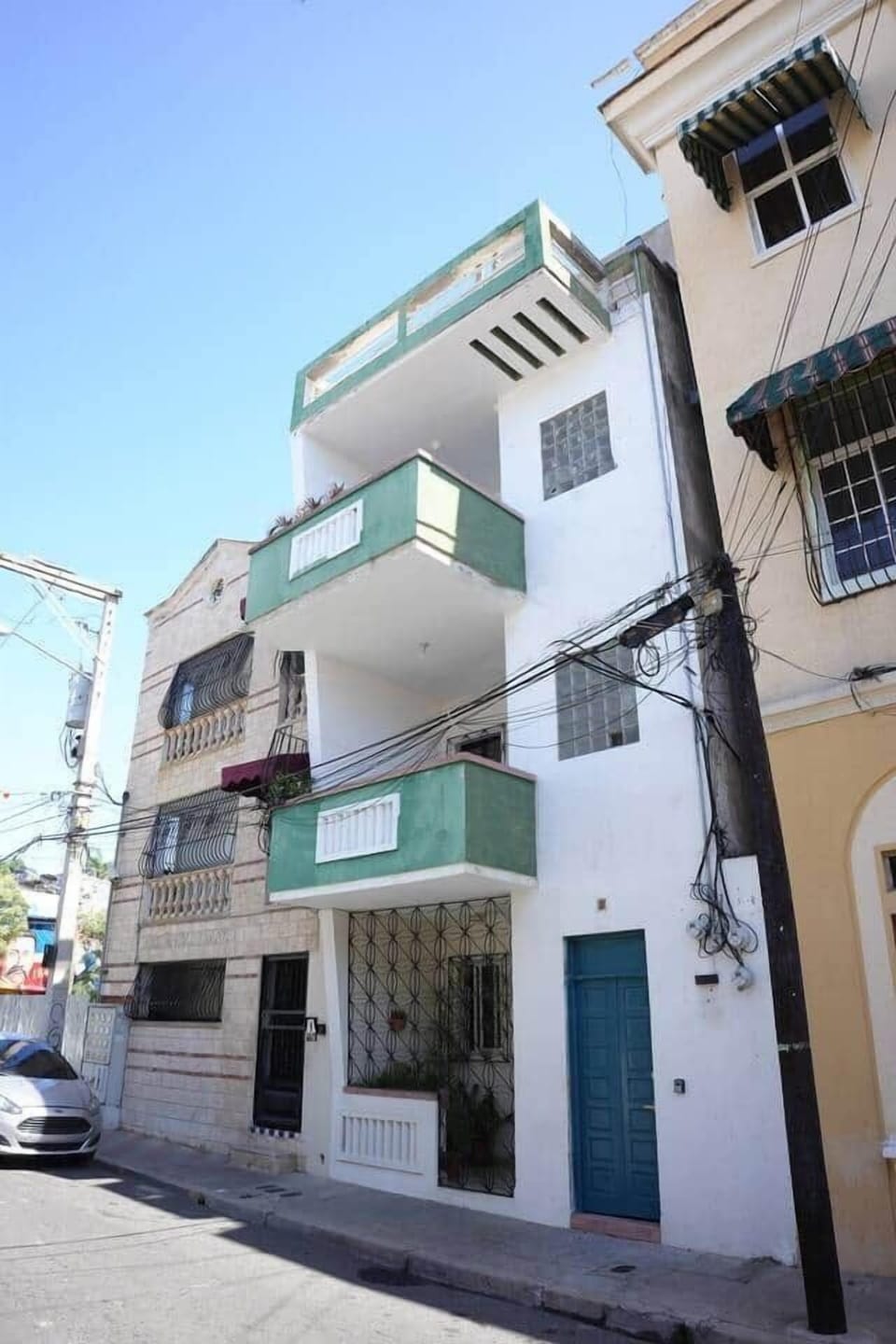 Charming multi-level building on a quiet Colonial Zone street—featuring private balconies, a vibrant façade, and easy access to Santo Domingo’s historic treasures.