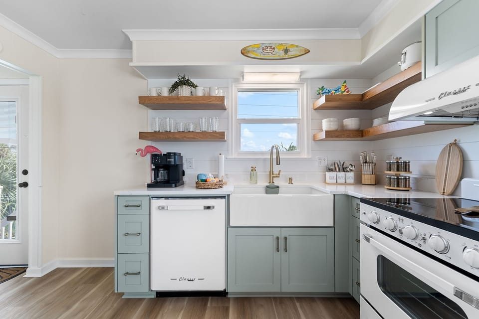 This "modern'-retro" kitchen is fully stocked for all of your cooking needs.