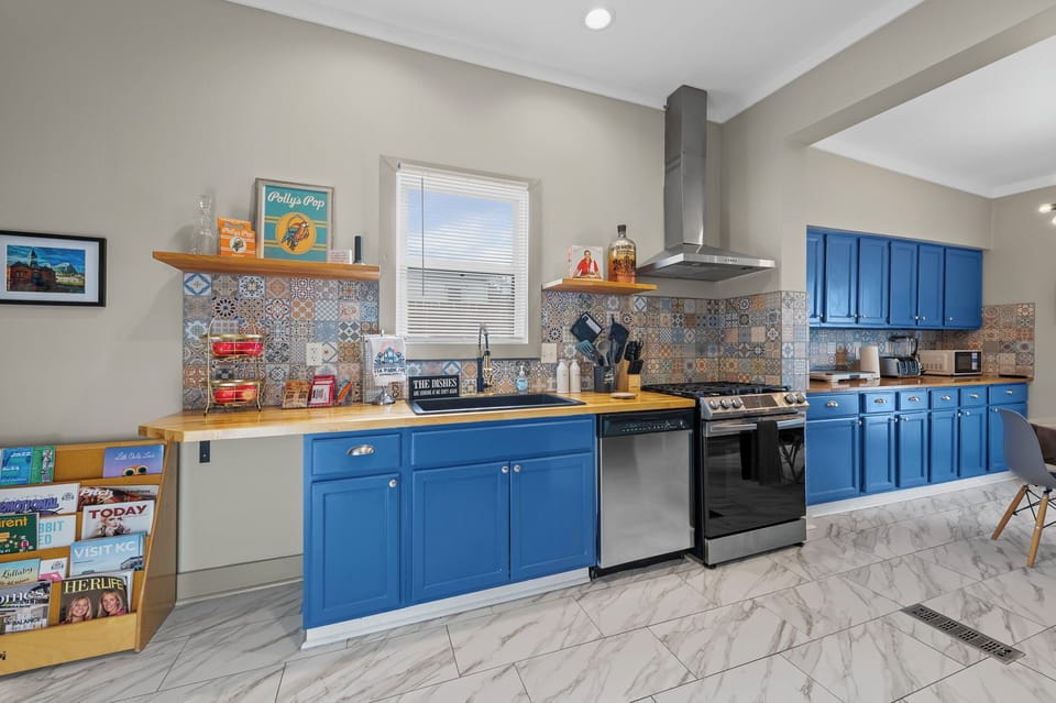 No camera tricks here... this kitchen is massive! Every amenity you may need.