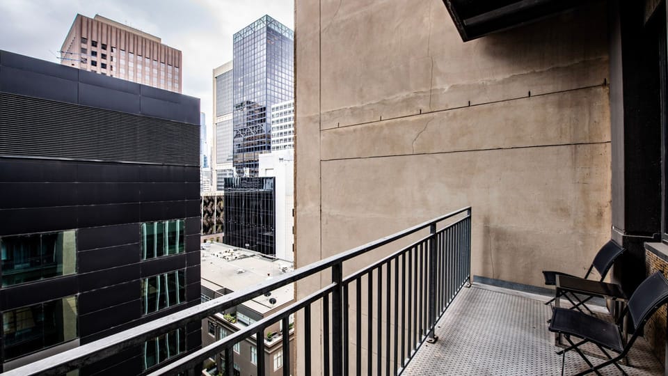 Balcony with city views and outdoor seating