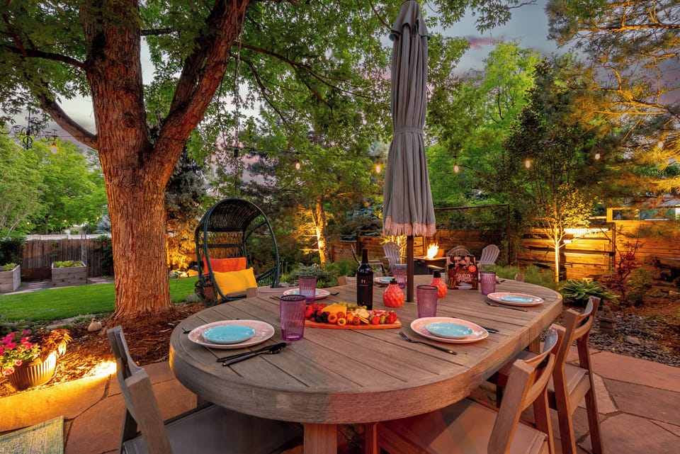 Dine al fresco under twinkling lights, surrounded by lush greenery!