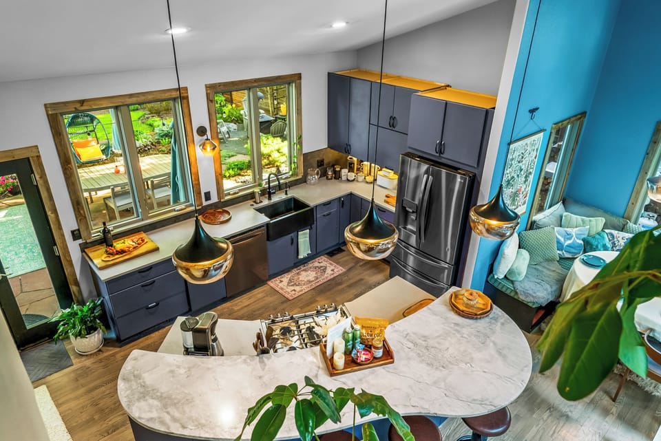 Stylish and modern space with sleek appliances and stunning natural light!