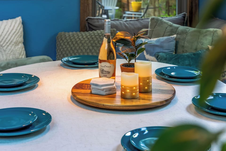 Bright, open space with stylish décor, inviting seating, and garden views