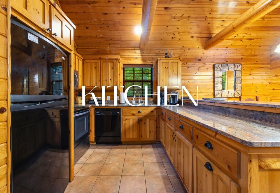 Kitchen with plenty of space and rustic wood accents.