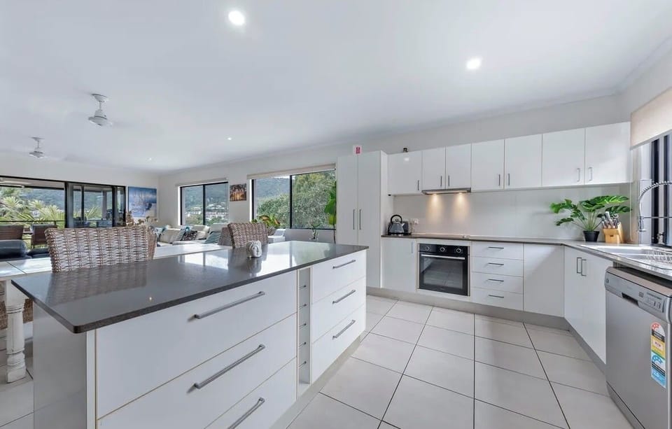 Full kitchen with dishwasher and microwave