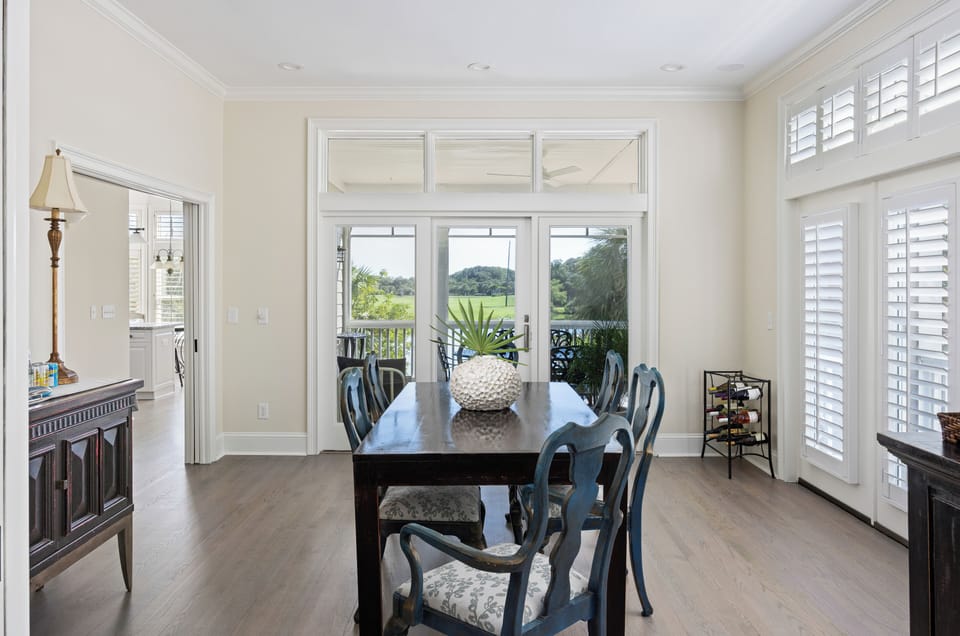 Dining area with seating for six plus water views.