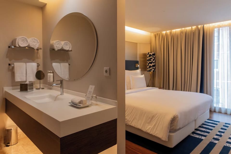 Refresh effortlessly at the sleek vanity with plush towels.