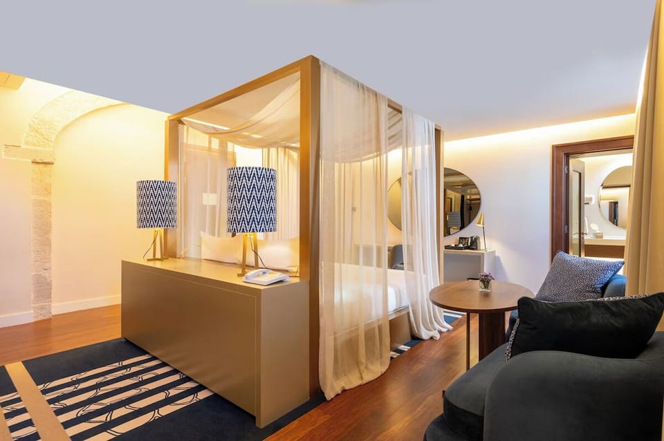 Unwind in your spacious suite with elegant lounge seating.