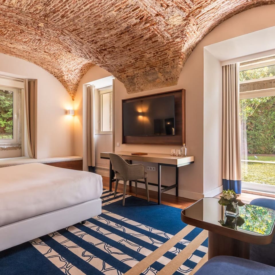 Kick back with easy TV viewing and bright window alcoves.
