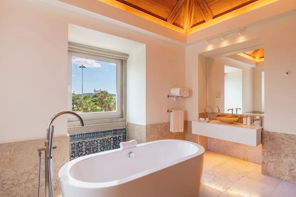 Refresh with a spa-like bath and calming countryside outlook.