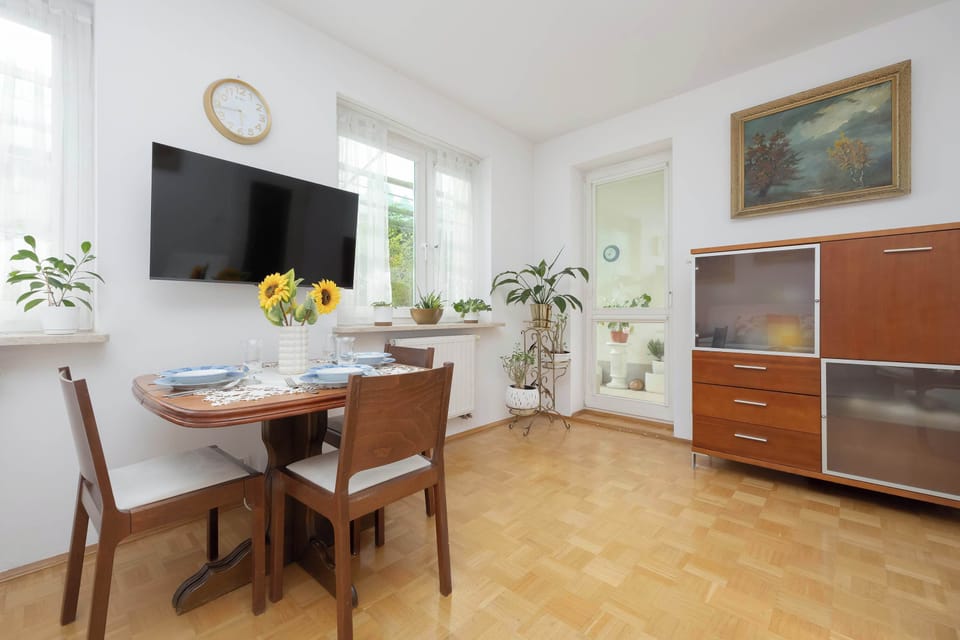 The sitting corner filled with natural daylight and classic furniture radiates a homely warmth.