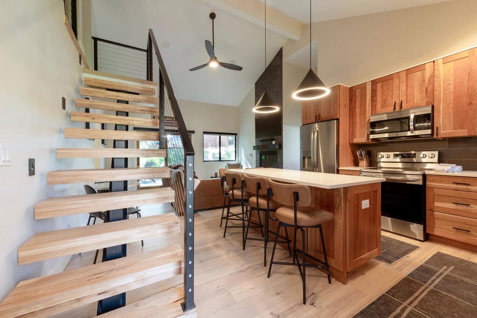 Stairs leading up to the 2nd floor bedrooms area.