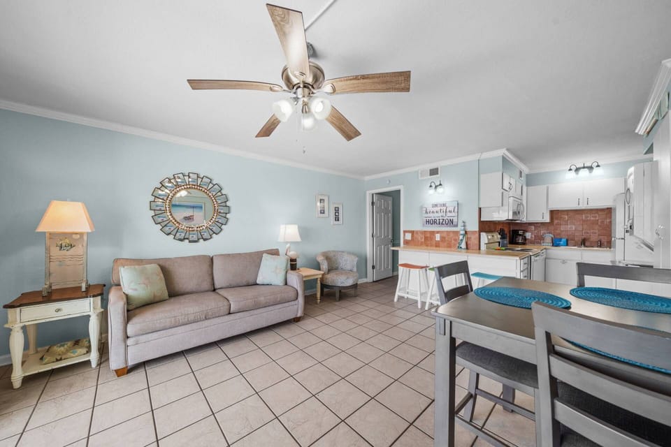 Bright, airy, and coastal-charmed — the perfect living space to kick back after a day on the beach. Something beautiful really is on the horizon!