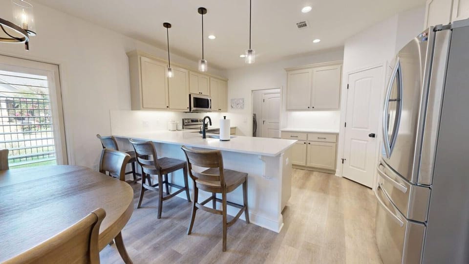 Kitchen with barstool seating.
