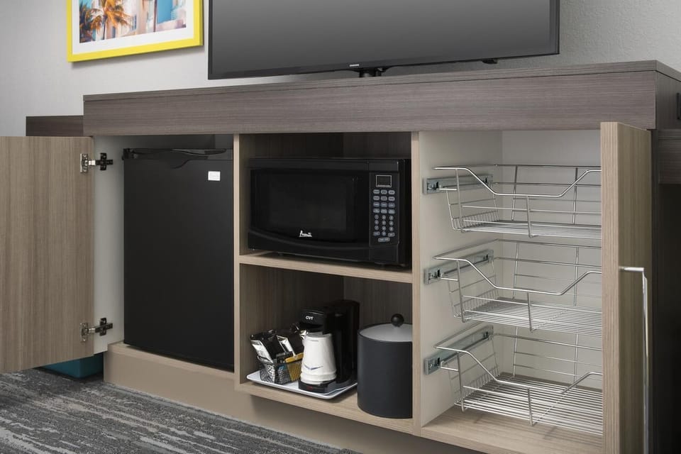 Unwind with in-room coffee, snacks, and chilled drinks anytime.