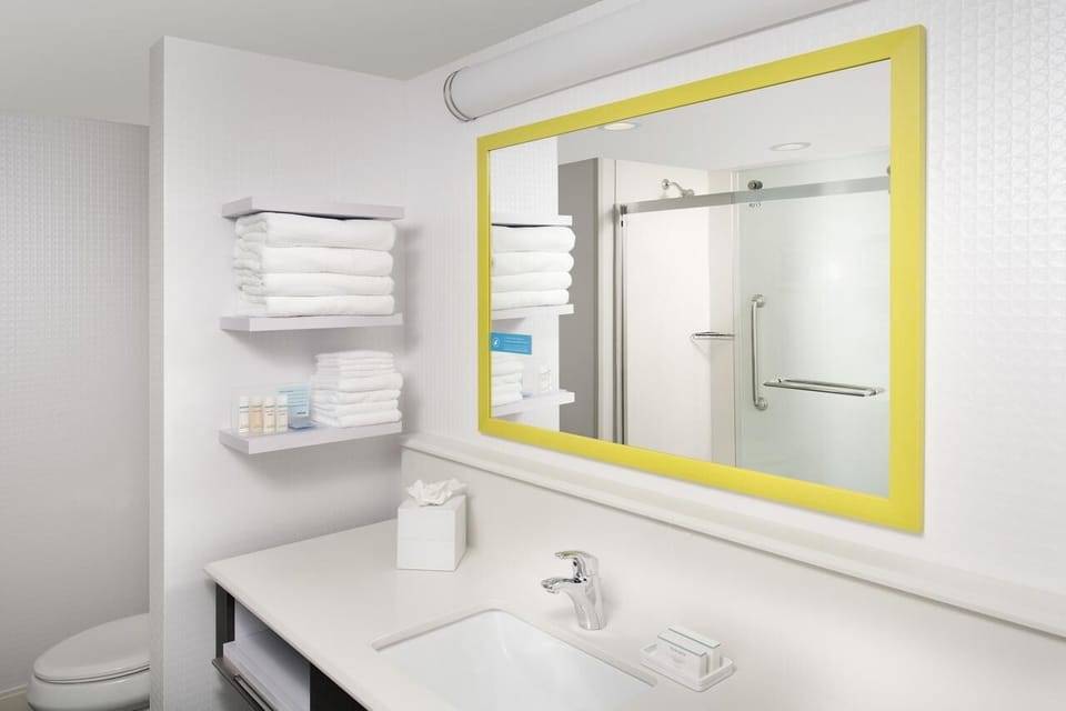 Refresh easily with bright vanity space and plush towel stacks.