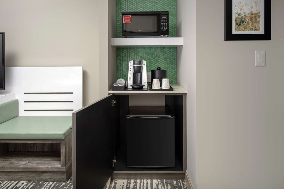 Start mornings with in-room coffee and easy mini-fridge snacks.