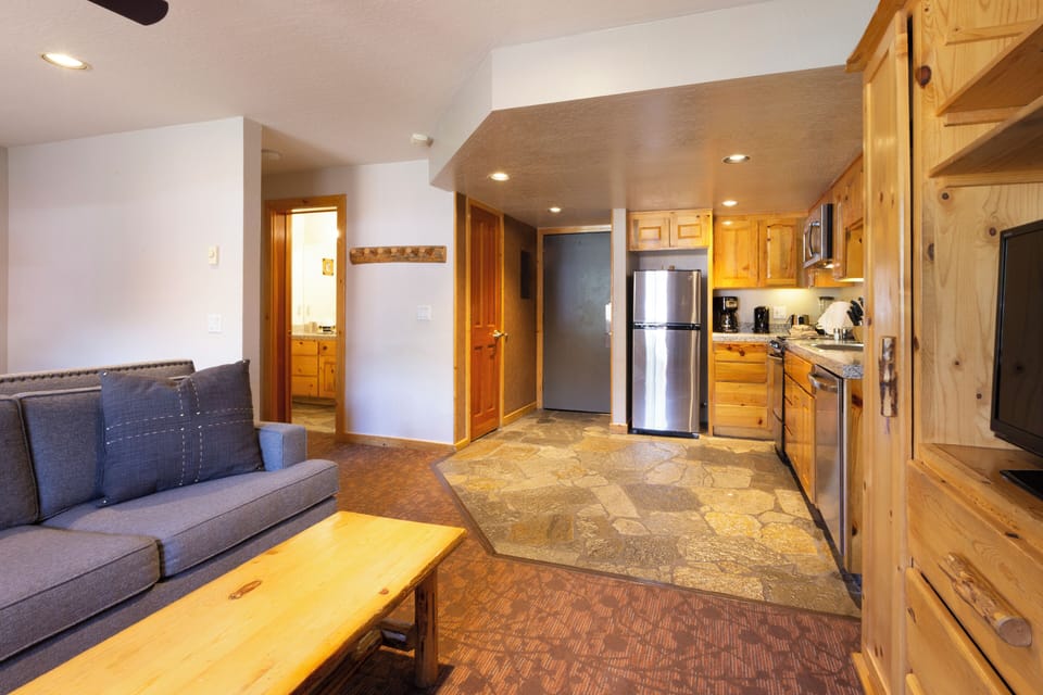 Cook with ease in a fully equipped, open-plan kitchen.
