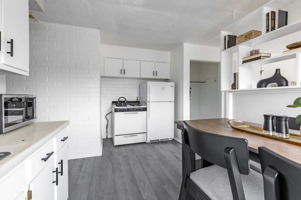 Full-Size Kitchen Appliances: Refrigerator and Gas Stove