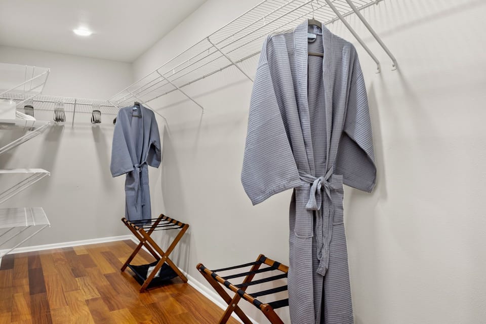 Primary walk-in closet leads to private primary ensuite