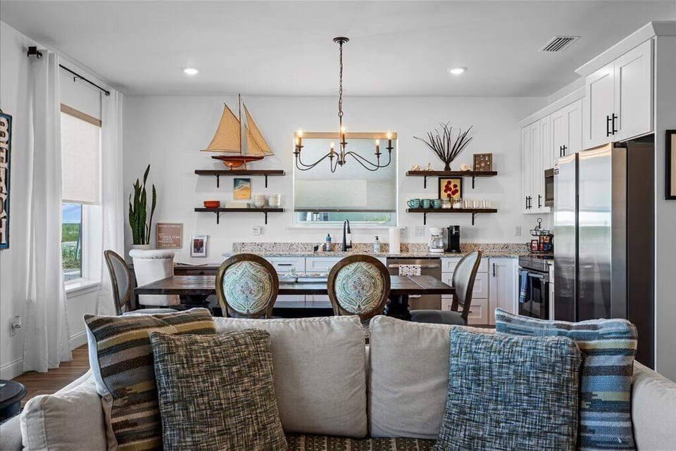 Open-concept living space with a view of the kitchen.