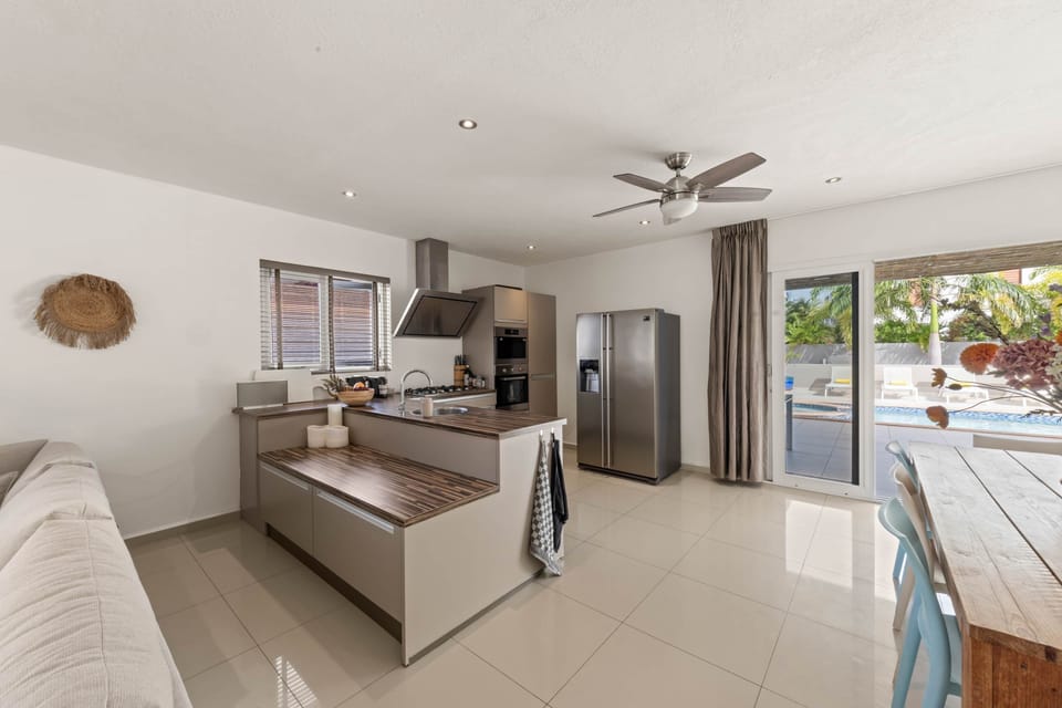 Spacious kitchen with all appliances, including dishwasher