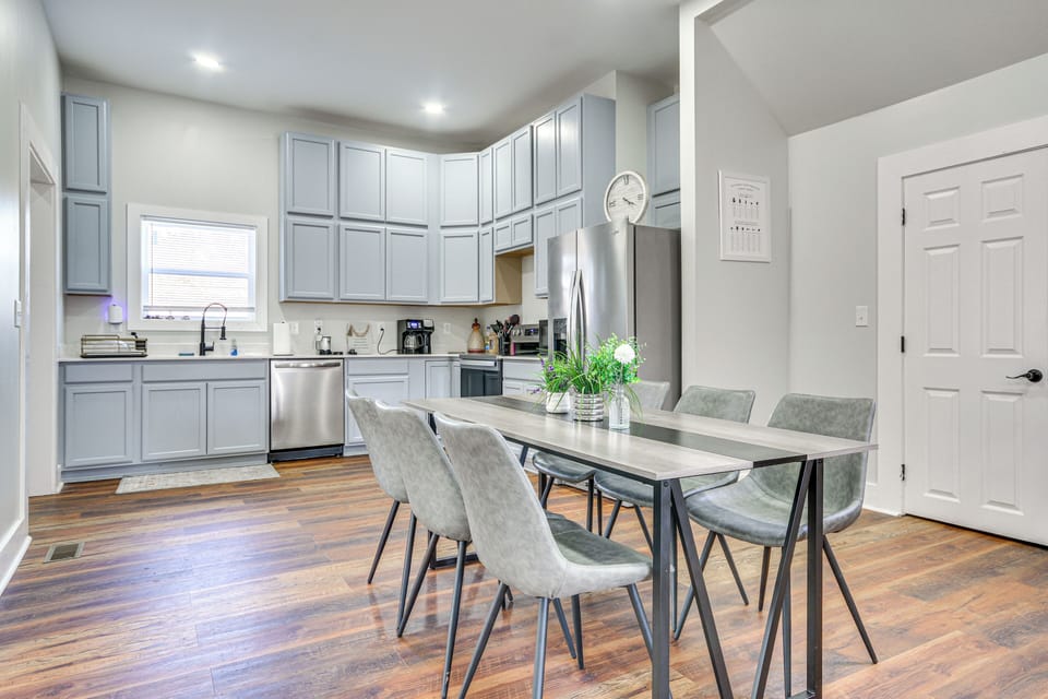 Dining Area | 1st Floor | Dishware/Flatware | Central Heating & A/C | Free WiFi