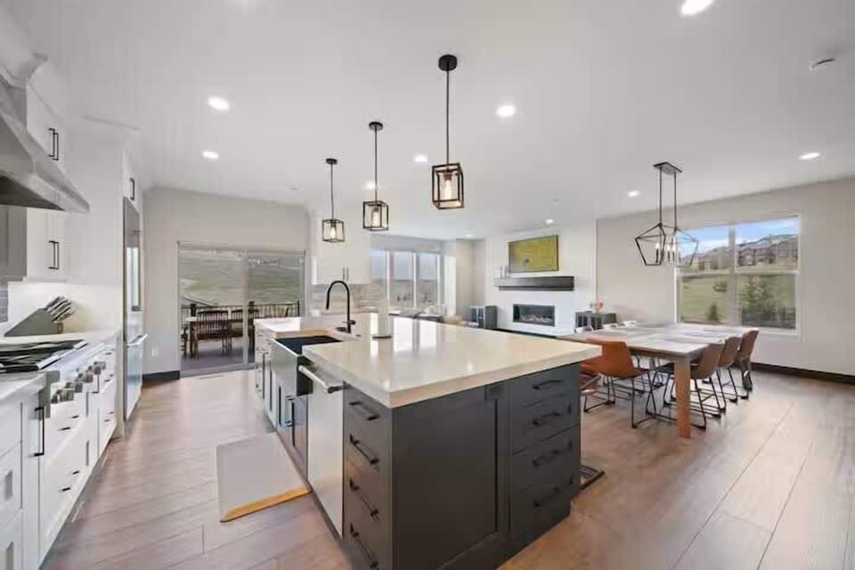 Kitchen overlooking main floor and deck