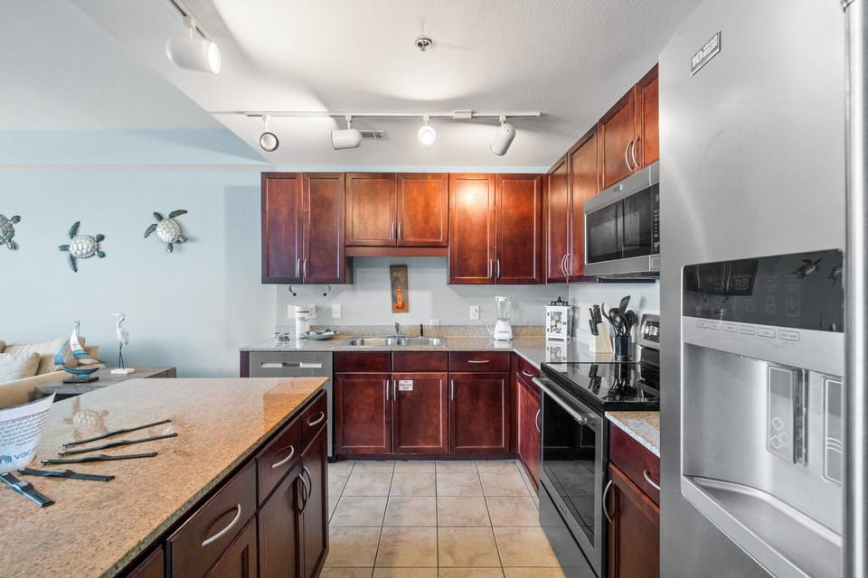 This thoughtfully designed kitchen offers both style and functionality, complete with modern appliances and all the utensils and cookware you need to prepare meals with ease.