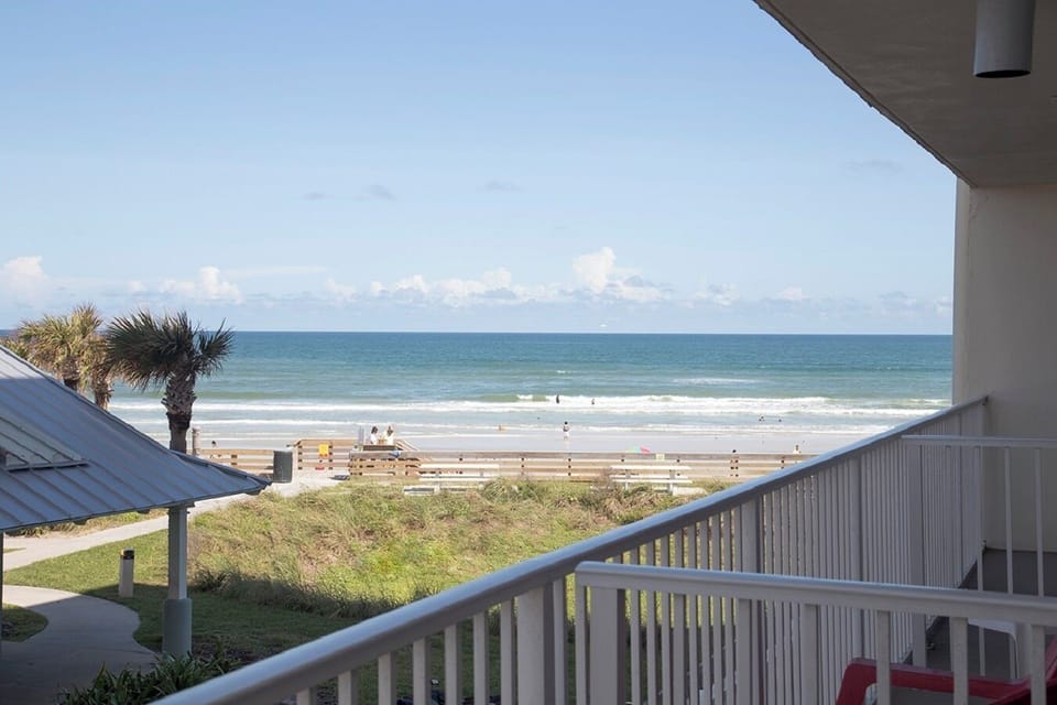 Unwind with panoramic ocean views right from your balcony.
