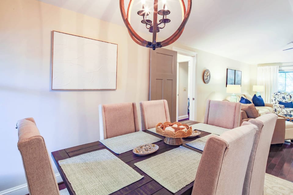 The dining table near the kitchen seats 6.