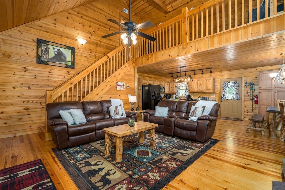 Walk a few stairs from the living room up to the loft area and find a plush sofa, games and another TV. 